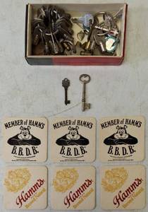 lot 45 image: Miscellaneous Keys & (6) Hamms B.B.D.B Coasters (View Photo)