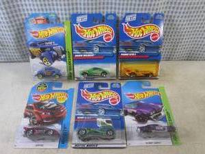 lot 90 image: (EC1) Assorted Hot Wheels in Packag...