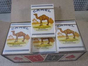 lot 146 image: (EC1) 12 New Decks Camel Cigarettes...