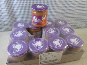 lot 275 image: (C-2) 12 Jars of Taco Bell Spicy Be...