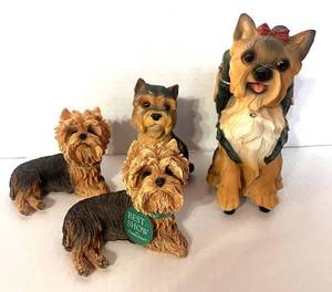 lot 94 image: Set of 4 Resin Yorkie Figurines