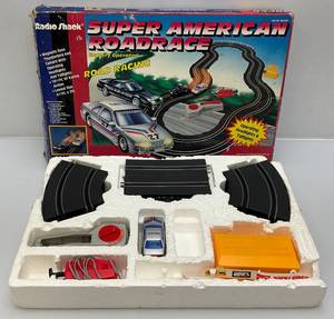 lot 34 image: Vintage Radio Shack Super American Roadrace Battery Operated Slot Track (Missing One Car) In Original Box