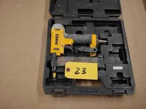 lot 23 image: Dewalt 23 ga. Trim Nailer...