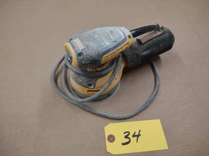 lot 34 image: Dewalt Palm Sander...