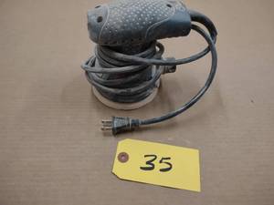 lot 35 image: Bosch Palm Sander...