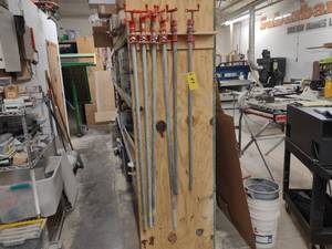 lot 49 image: (4) 54 & (2) 48 Pipe Clamps...
