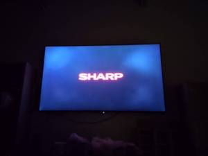 lot 281 image: Sharp 70 Flat Screen TV with Remote...