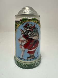 lot 34 image: J.C. Leyendecker Christmas Collection Stein
