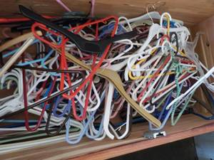 lot 5 image: 125 Plastic Hangers- some wood and ...