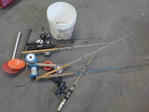 lot 49 image: Fishing Rods and more in a bucket...