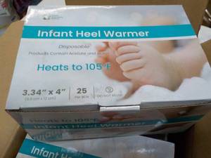 lot 186 image: 4 ct 25 per box Infant Heel Warmers...