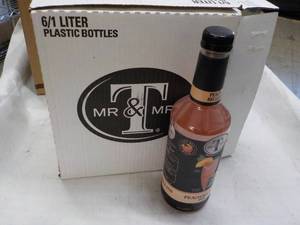 lot 202 image: 6 ct 1 Liter Bottles Mr and Mrs Pea...