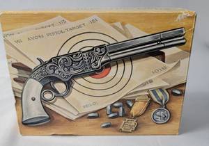 lot 48 image: Decanter - Avon Volcanic Repeating Pistol - Wild Country Cologne (Empty)