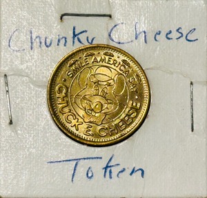 Vintage 1986 Gold-Toned Arcade Game Token featuring the Chuck E. Cheese Mascot