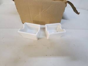 lot 87 image: Set of 12 White Porcelain Sugar Caddies