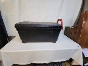 lot 100 image: Black Wheeled Tool Storage Box with Red Handles