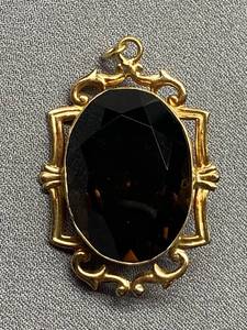 lot 97B image: Gold Tone Pendant with Brown Gemstone