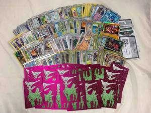 lot 16J image: Extensive 200 Pokmon Card Collection with Sleeves and Code Cards