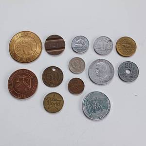 lot 34 image: Wild Assortment of 13 various collector coins from around the world.