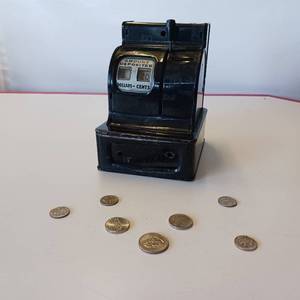 lot 42 image: Uncle Sams Savings Bank - Vintage Coin Bank that tracks your deposits