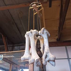 lot 19 image: Bovine bone wind chime w hard wood door knob knocker