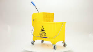lot 16 image: Mind Reader 5.5 Gal. Yellow Plastic Mop Bucket with Wringer Floor Cleaning, Handle, Wheels   Customer Returns See Pictures