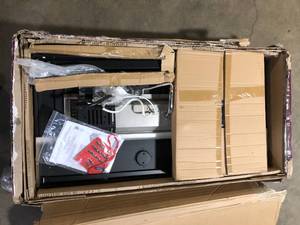 lot 36 image: Home Decorators Collection Corden 49.6 in. W 50000 Btu black Steel Propane Outdoor Fire Pit with Fire Glass Open Boxes Customer Returns See Pictures