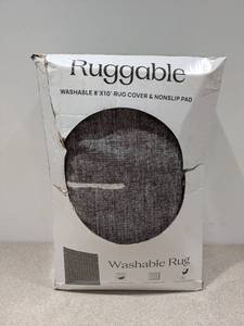 lot 7 image: NEW RUGGABLE WASHABLE RUG & NONSLIP PAD- DAMAGED BOX
