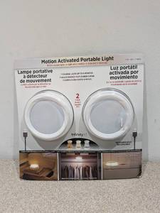 lot 64 image: NEW INFINITY X1 MOTION ACTIVATED PORTABLE LIGHT