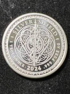 lot 22 image: 1 TROY OZ .999 FINE SILVER 2024 SILVER SHIELD ROUND