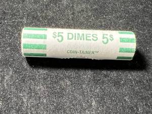 lot 29 image: BANKROLL OF 5 FACE US SILVER DIMES UNOPENED