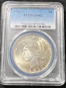 lot 32 image: 1923 US PEACE SILVER DOLLAR PCGS MS62