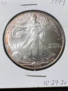 lot 34 image: 1999 AMERICAN SILVER EAGLE 1 TROY OZ .999 FINE SILVER