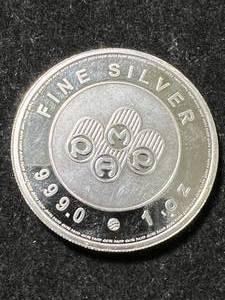 lot 48 image: 1 TROY OZ .999 FINE SILVER PAMP ROUND