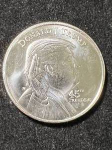 lot 53 image: 1 TROY OZ .999 FINE SILVER DONALD TRUMP ROUND