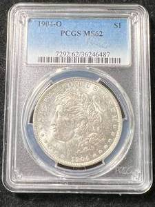 lot 64 image: 1904-O US MORGAN SILVER DOLLAR PCGS MS62