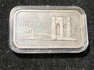 lot 76 image: 1 TROY OZ .999 FINE SILVER BROOKLYN BRIDGE BAR IN AIRTITE