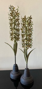 lot 61 image: Two Decorative Metal Floral Stems by Global Views