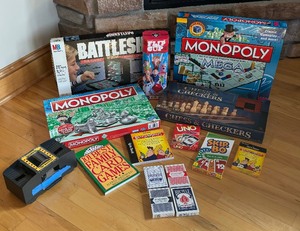 lot 79 image: Games Galore including Monopoly, Battleship, Uno, Skip Bo and More