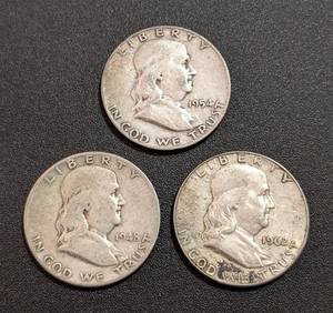 lot 191 image: Three Franklin Liberty Half Dollars