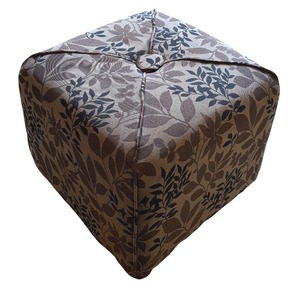 lot 45 image: Lovely Upholstered Ottoman with Browns, Blacks and Leaves