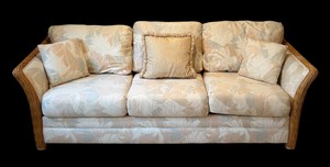 lot 7 image: Beautiful Ratan Sofa with Muted Tropical Colors