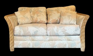 lot 8 image: Beautiful Ratan Love Seat with Muted Tropical Colors