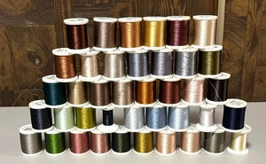 lot 25 image: Variety of Medeira Thread