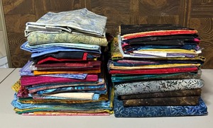 lot 87 image: Stacks of Fine Fabric