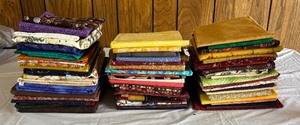 lot 110 image: Three Stacks of Fabulous Fabric