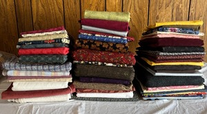 lot 137 image: Three Stacks of Fantastic Fabric