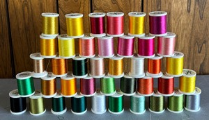 lot 172 image: Many Medeira Thread Spools