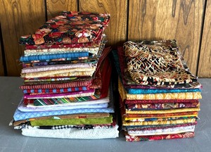lot 173 image: Two Stacks of Fine Fabric