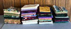 lot 174 image: Piles of Pretty Fabric